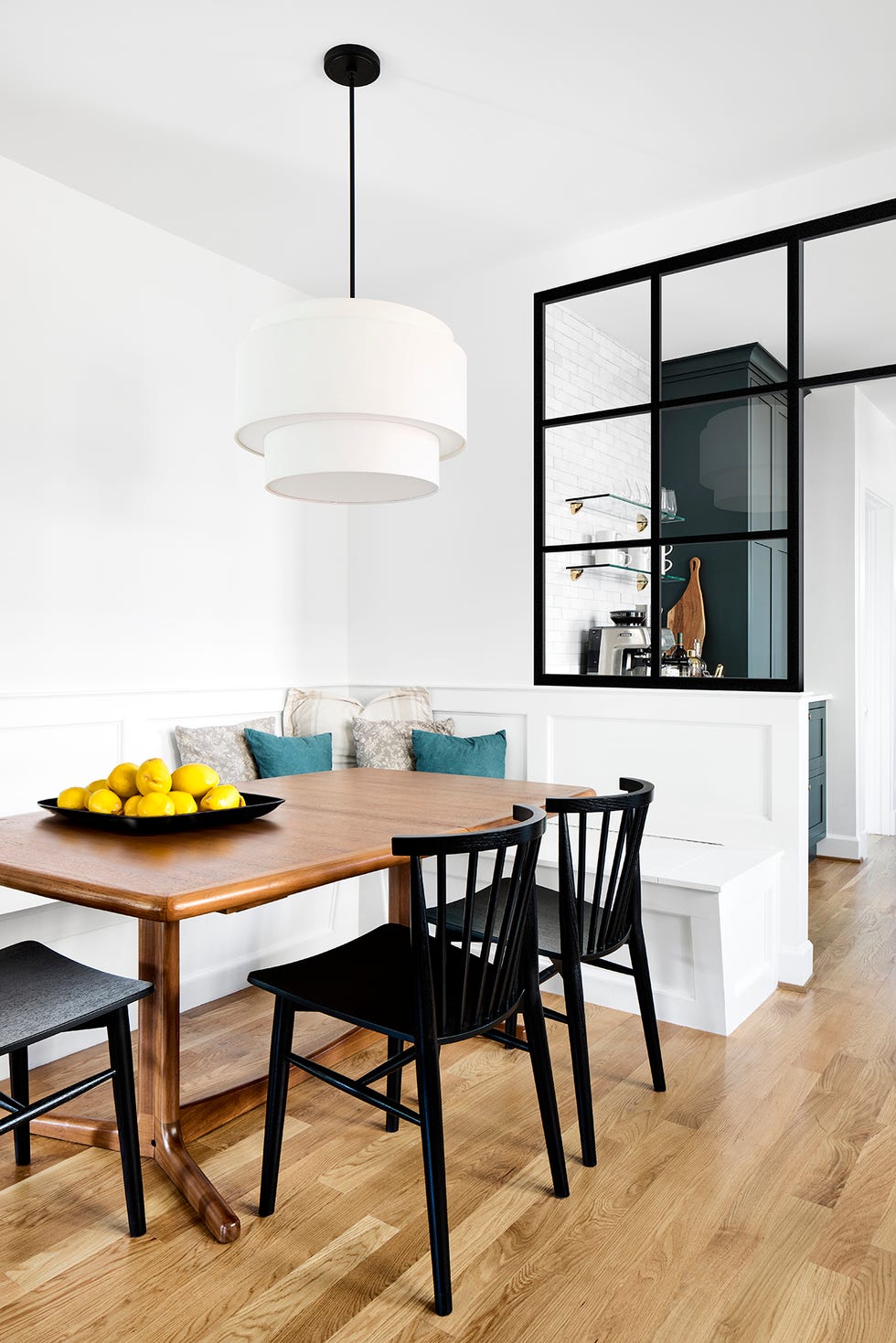 a dining table with a lamp