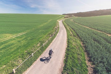 elevated shot of solo cyclist