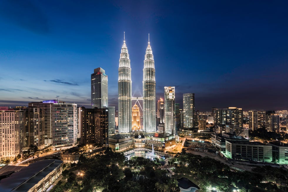 elevated view of the petronas towers at dusk