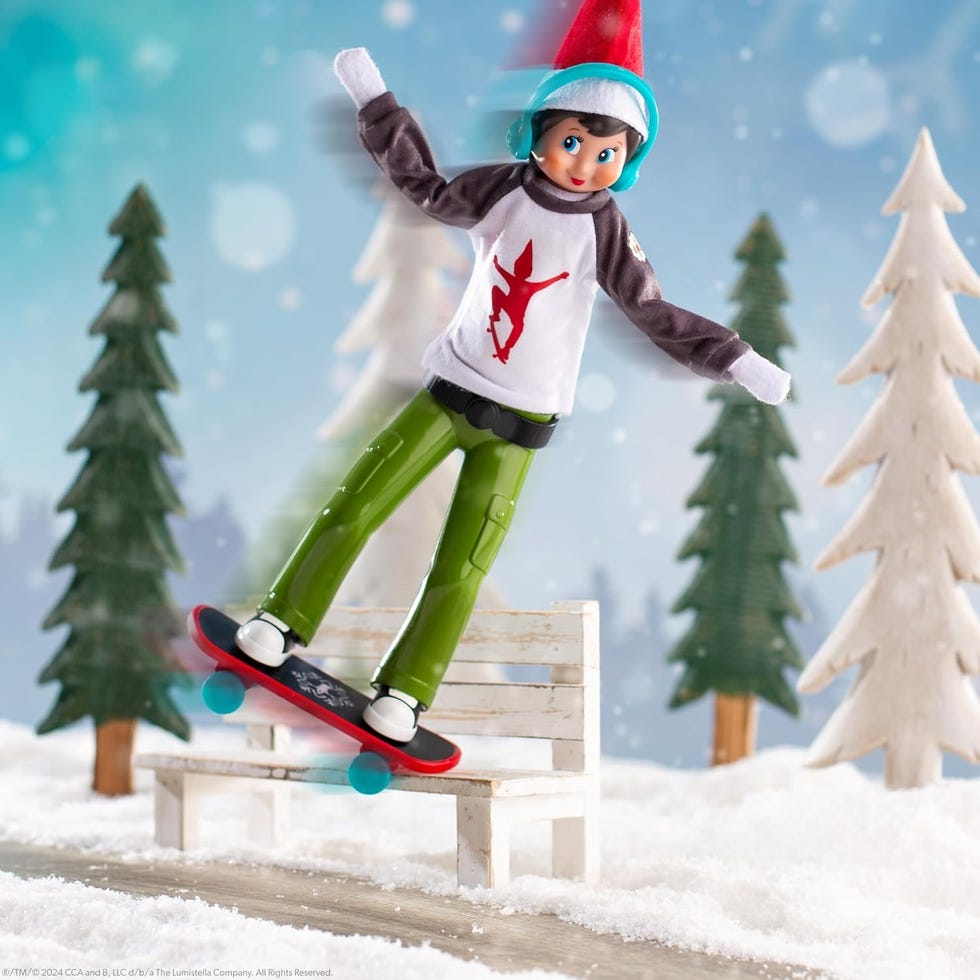 elf on the shelf performing a skateboard trick on a bench in a snowy scene