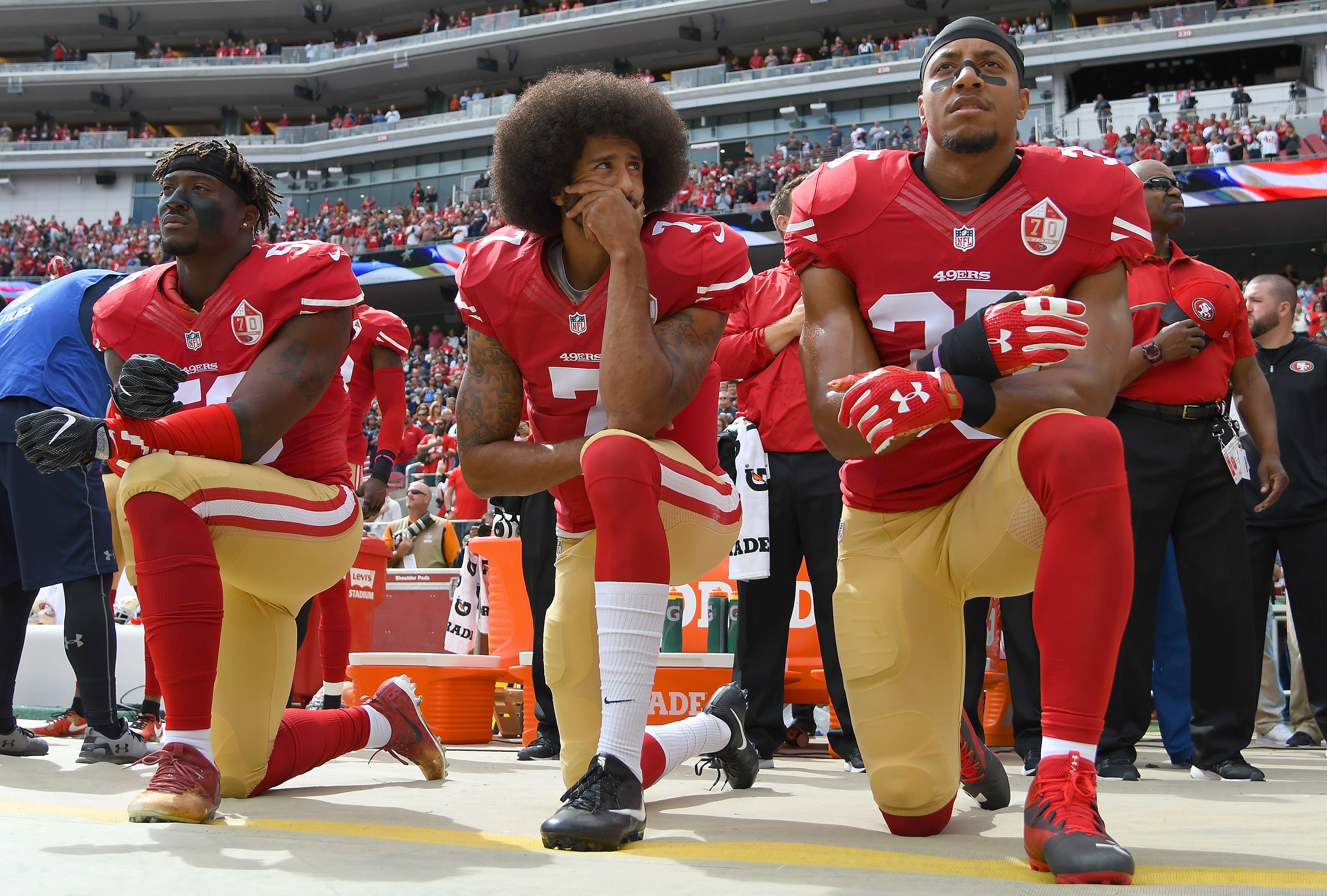 Eric Reid of the San Francisco 49ers stands on the sideline prior to