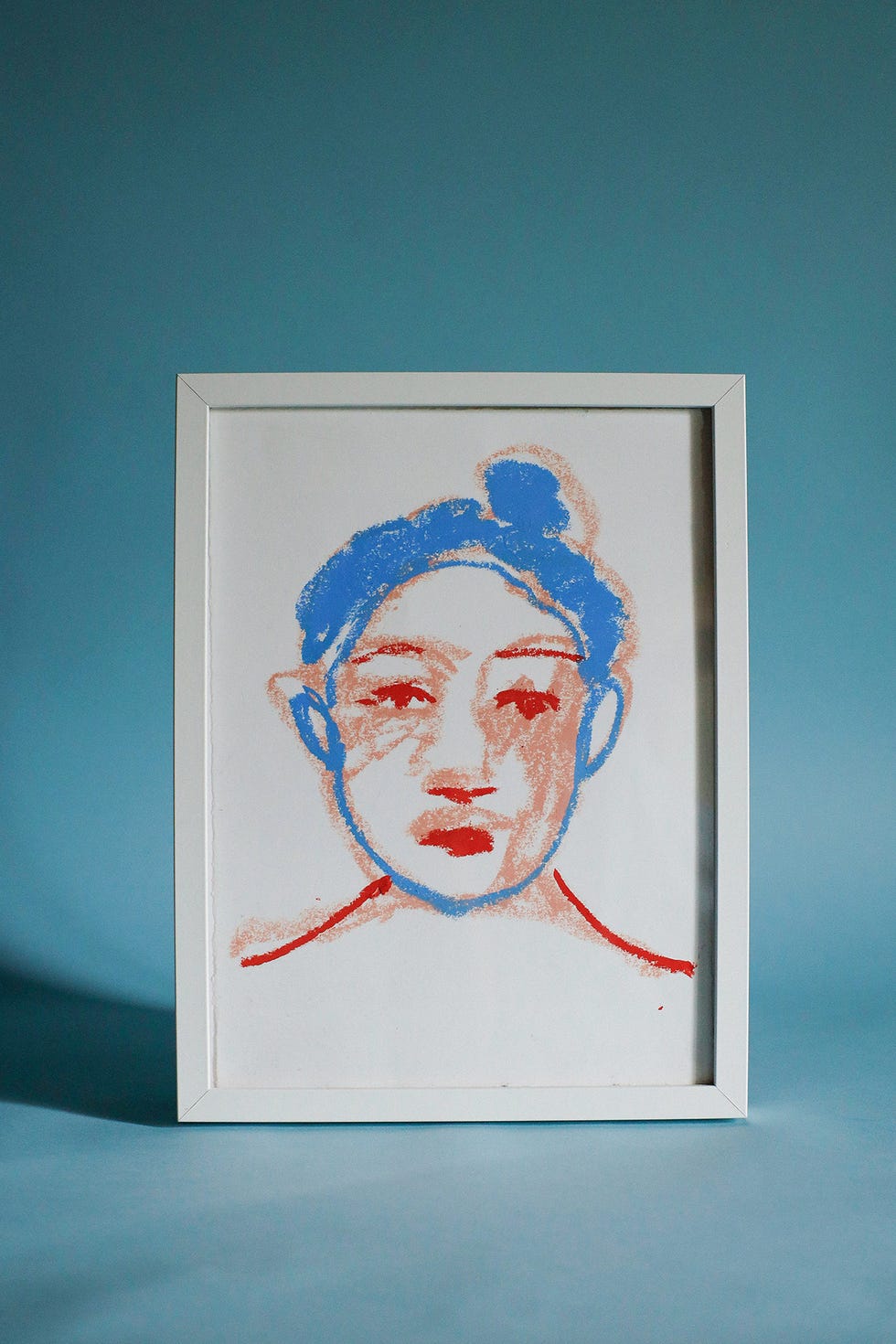 framed artwork featuring abstract lines and colors