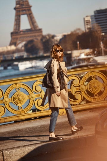 a person standing on a bridge