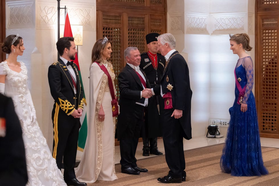 el rey belga y su heredera en la boda de hussein de jordania