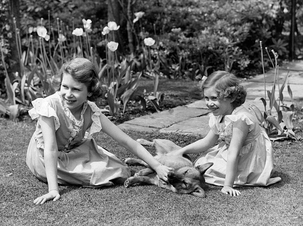 princess elizabeth and princess margaret with their corgi dog jane