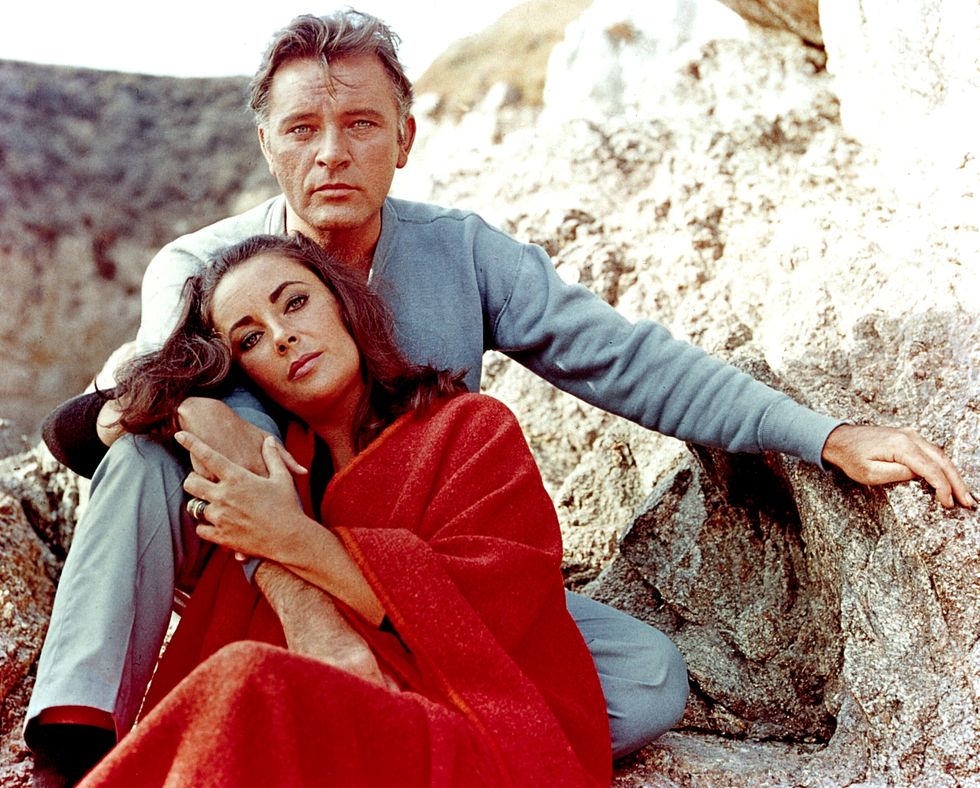 Elizabeth Taylor and Richard Burton on the film set of "The Sandpiper" in 1965