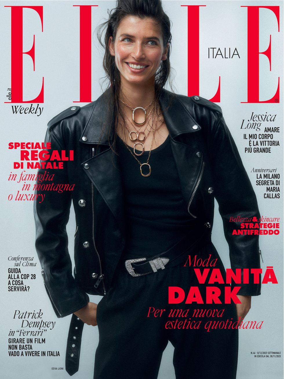 a woman smiling on a magazine cover