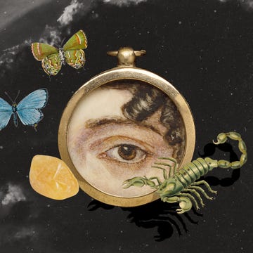 a round locket with a detailed painting of an eye set against a dark background, surrounded by colorful butterflies, a green scorpion, and a piece of amber the butterflies are vibrant, with one blue and one multicolored, adding a contrast to the darker elements and providing a sense of movement the scorpion is depicted in a realistic style, accentuating its scuttling form, while the amber stone adds a natural, earthy texture to the composition