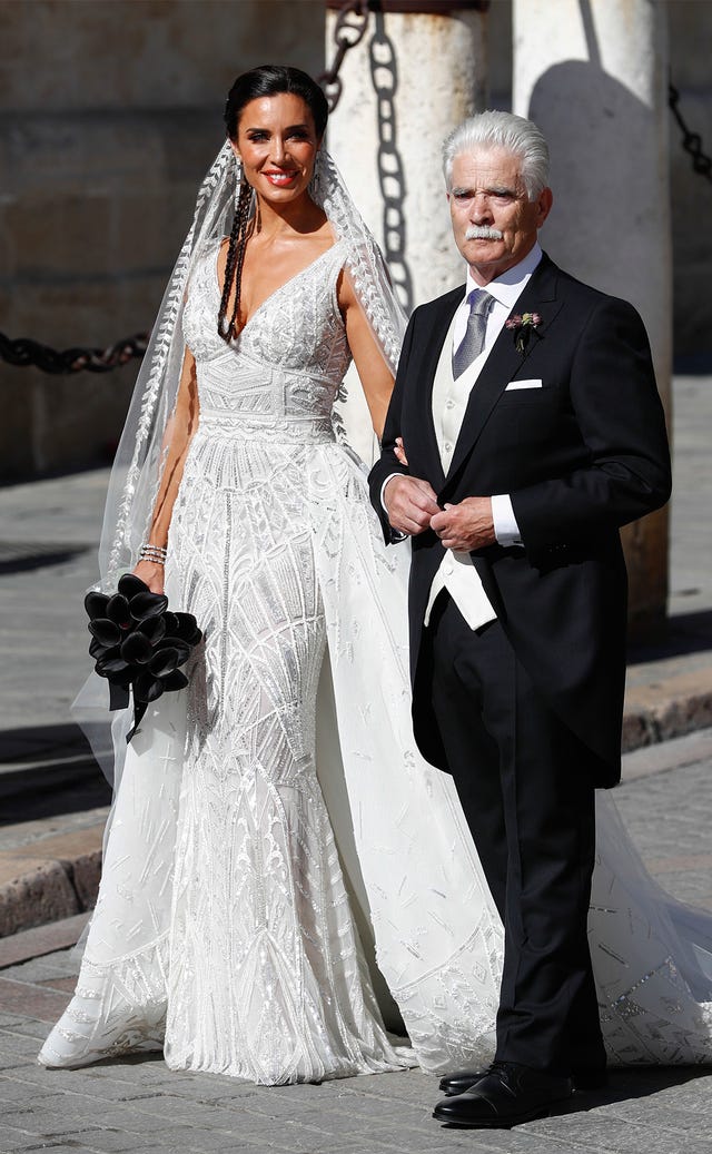 Wedding dress, Gown, Dress, Clothing, Bridal clothing, White, Suit, Photograph, Formal wear, Bride, 