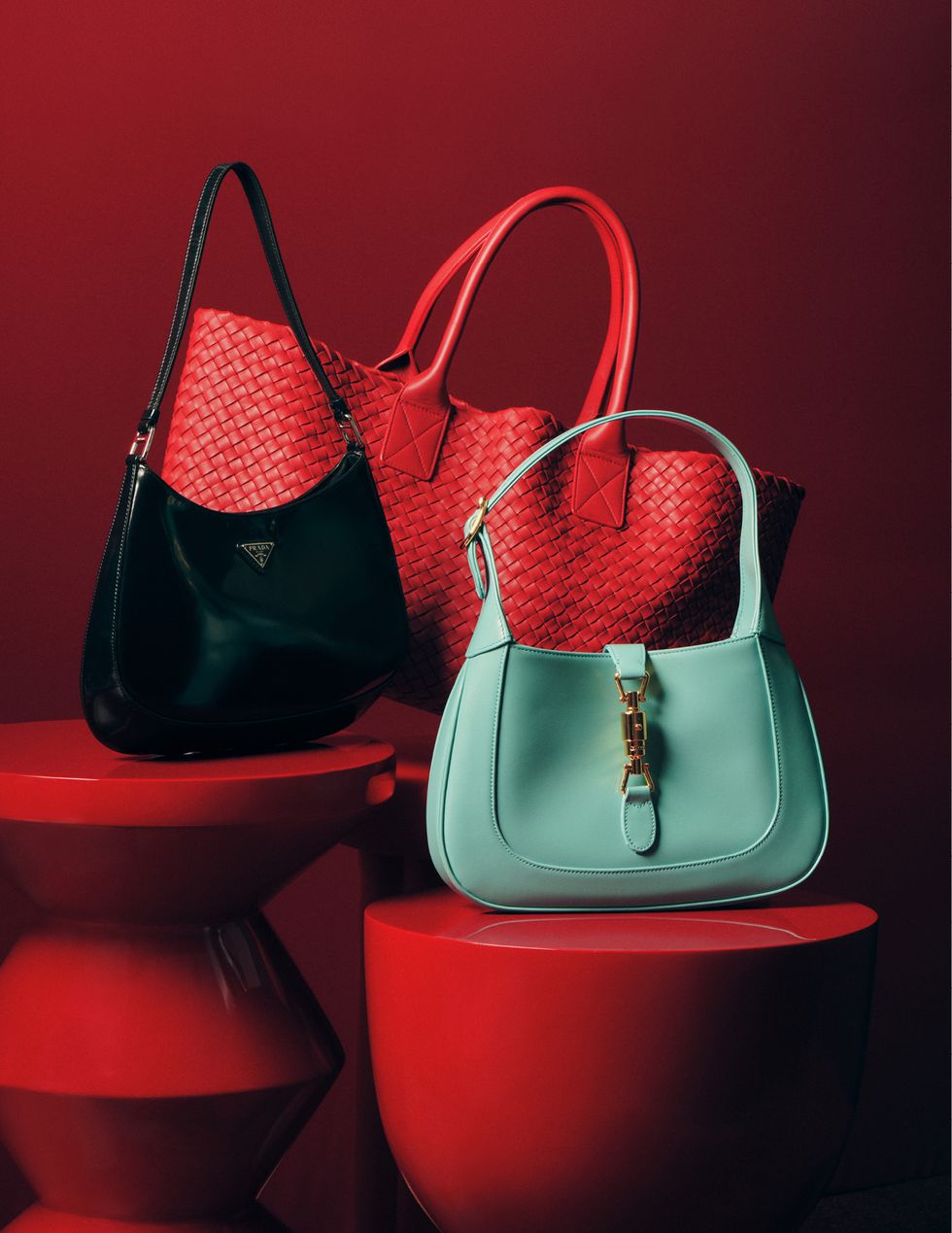 a pair of purses on red buckets