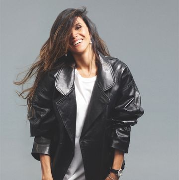 a person in a black leather jacket