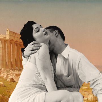 ruins of the parthenon with couple in passionate embrace