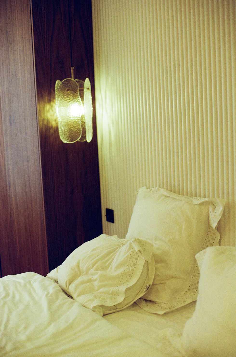 a lamp on a bed