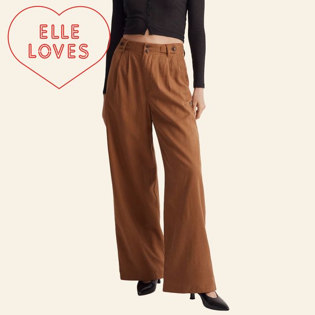 a woman modeling a brown pair of trousers