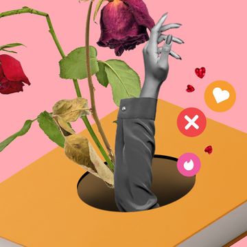 a hand and dead flowers reaching out of a book