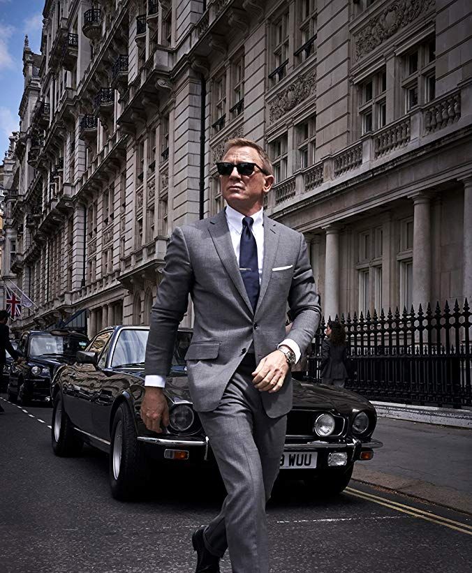 Vehicle, Luxury vehicle, Suit, Car, Street fashion, Personal luxury car, Formal wear, Photography, Mid-size car, Street, 