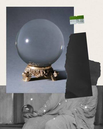 a woman holding a crystal ball