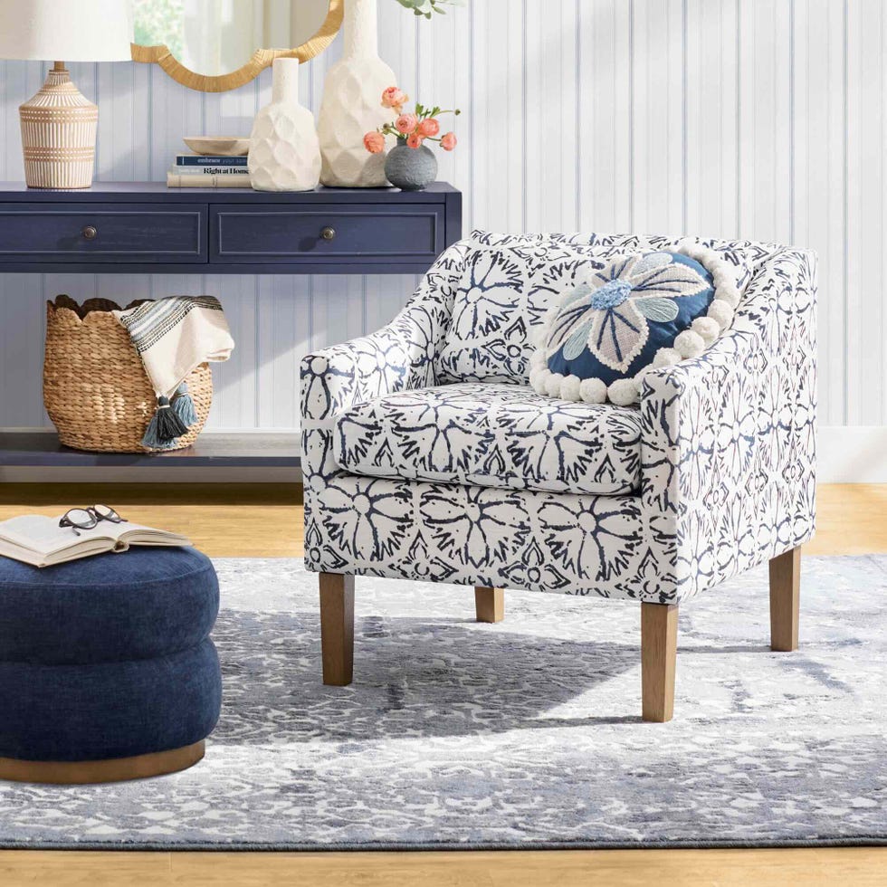 patterned occasional chair with throw pillow