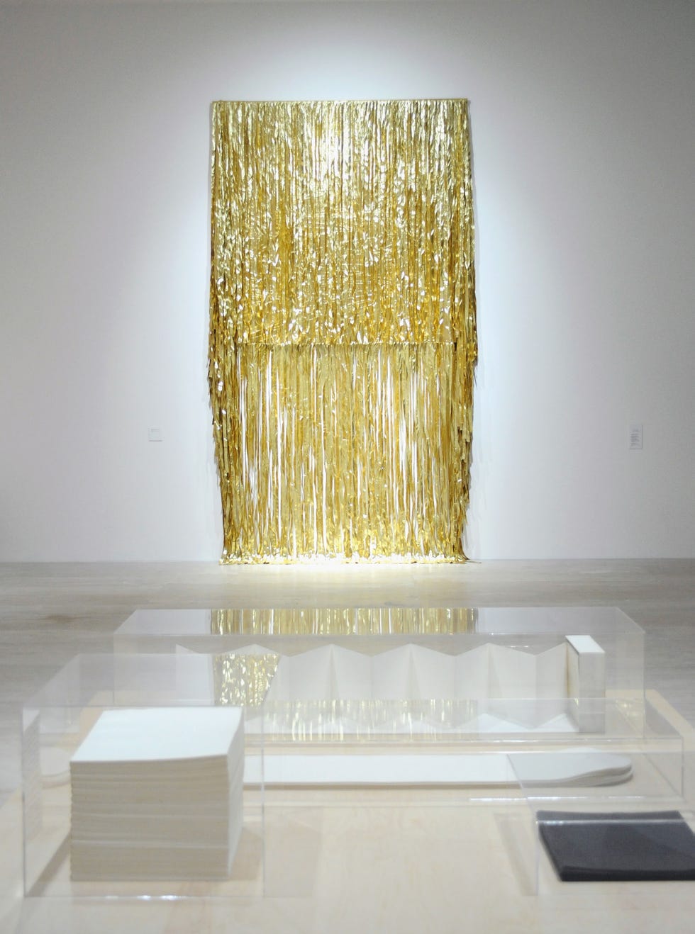 a gold sculpture on a table