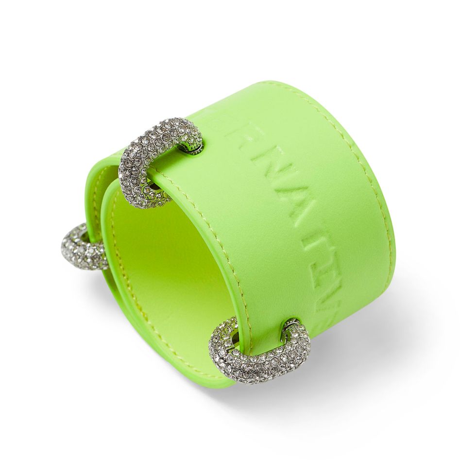 a green wrist cuff with jeweled accents