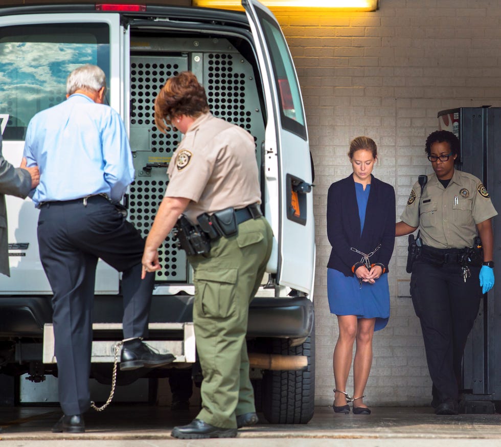 molly and tom enter the prisoner transport van