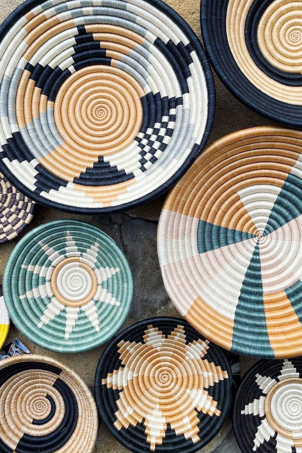 sisal fiber–crafted bowls made by female artisans of the abizeranye cooperative using traditional weaving methods and patterns