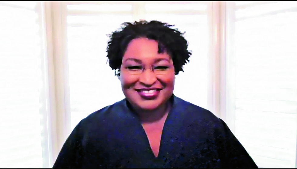 a screenshot of stacey abrams from zoom