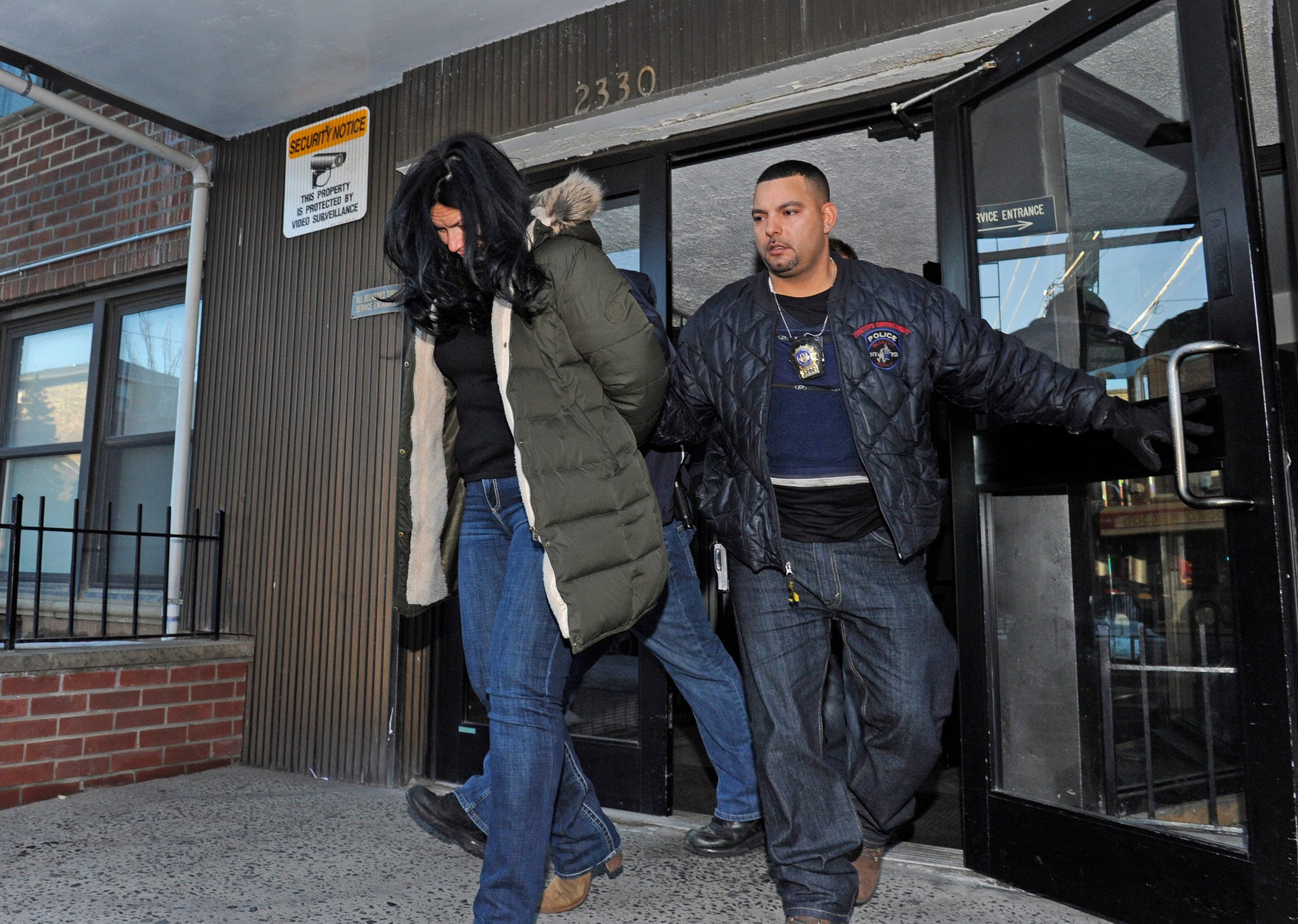 exclusive march 19, 2017 new york, ny usa: viktoria nasyrova (pictured, black hair) taken into custody for a murder she allegedly committed in russia. 2330 voorhies avenue, brooklyn, ny. russian authorities charged nasyrova with the murder of 54 year old victim alla alekseenko in november 2014. they issued an interpol red notice to international authorities when they discovered she‚Äôd fled the country shortly after.(gregory p. mango / polaris) /// 