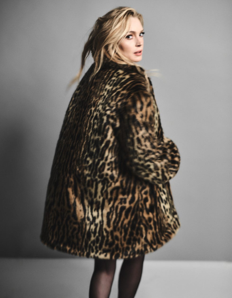 lindsay lohan wearing a print jacket