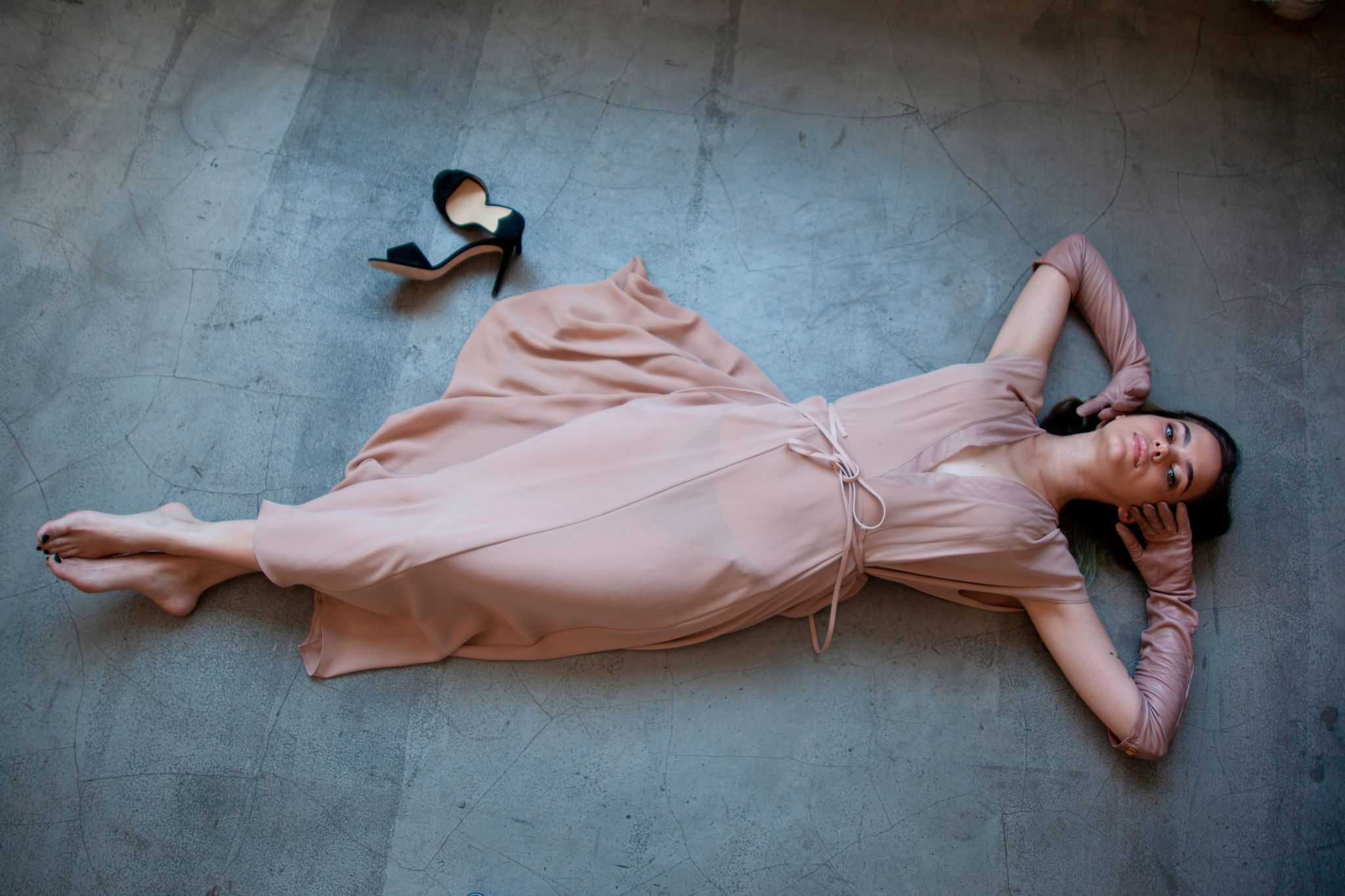 woman lies on floor