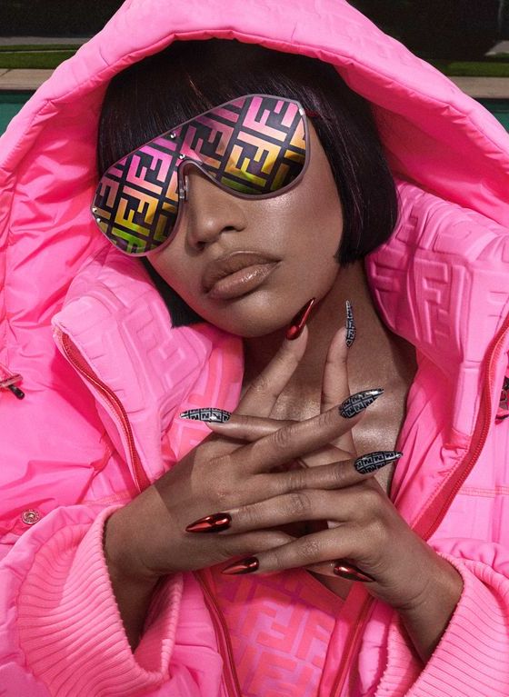 Nicki Minaj: Shearling Jacket, Metallic Dress
