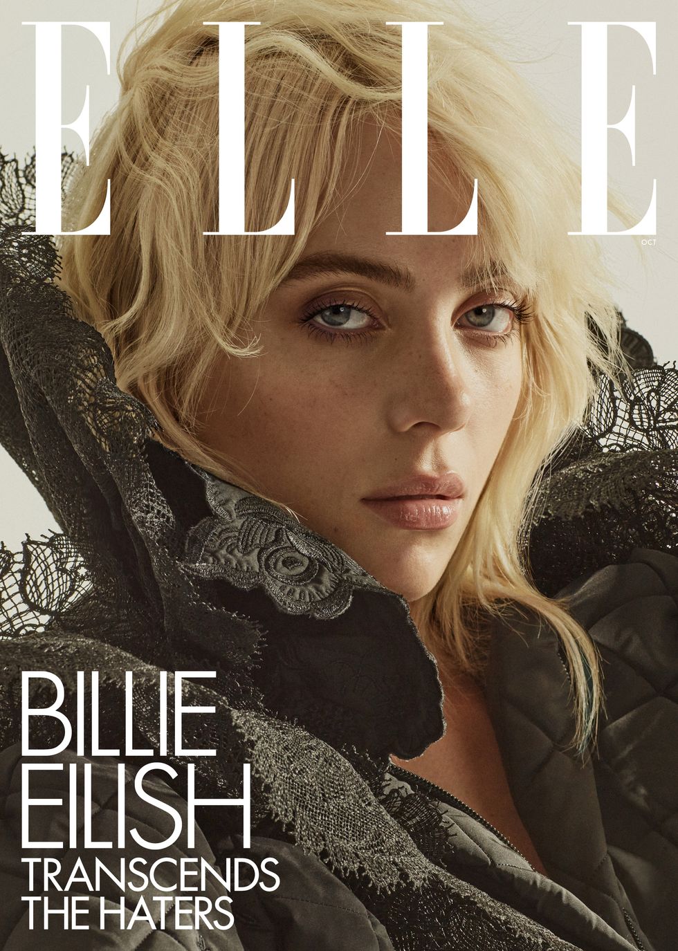 the elle cover shows billie eilish in a black dress with a high lace collar