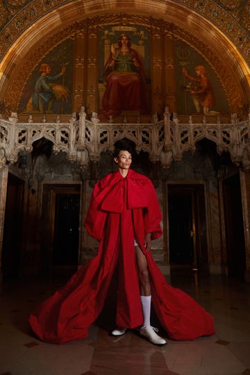 willy chavarria model wearing red outfit and white shoes