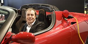 elon musk , chairman of the board of directors and ceo of tesla motors former president  and founder of paypal at a tesla motors press conference at the 2009 north american auto show  tesla makes the tesla roadster which is an all electric sports car