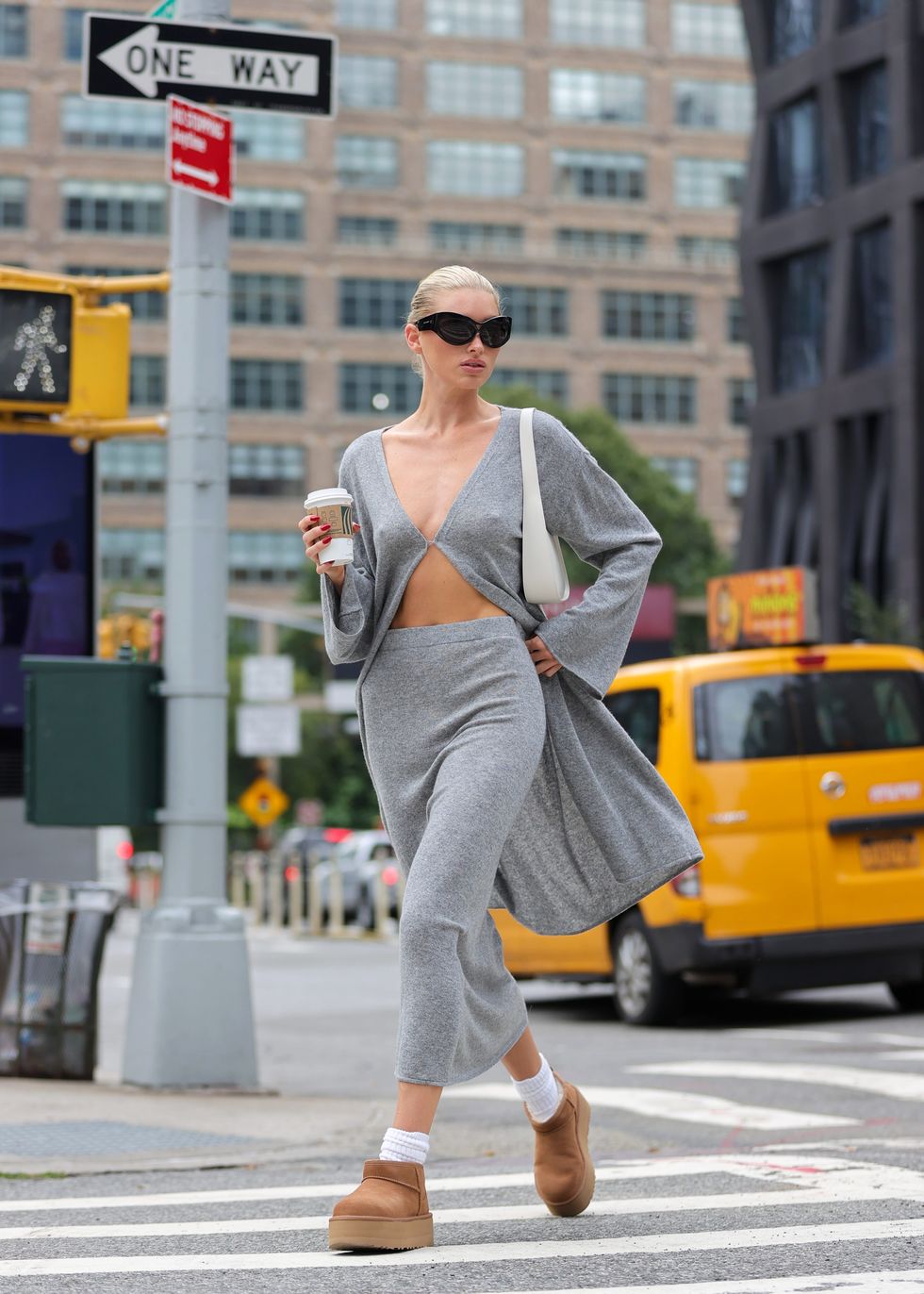 elsa hosk nyc street style gray skirt and ugg boots