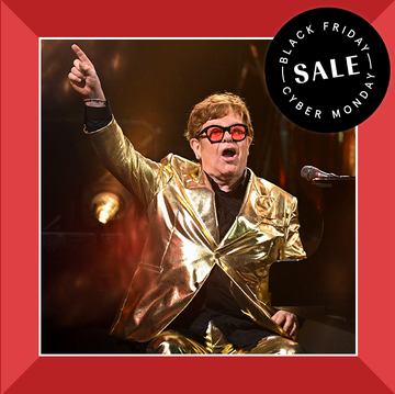 gold holiday candle, elton john on stage, black friday cyber monday sale gold holiday candle, elton john on stage, black friday cyber monday sale