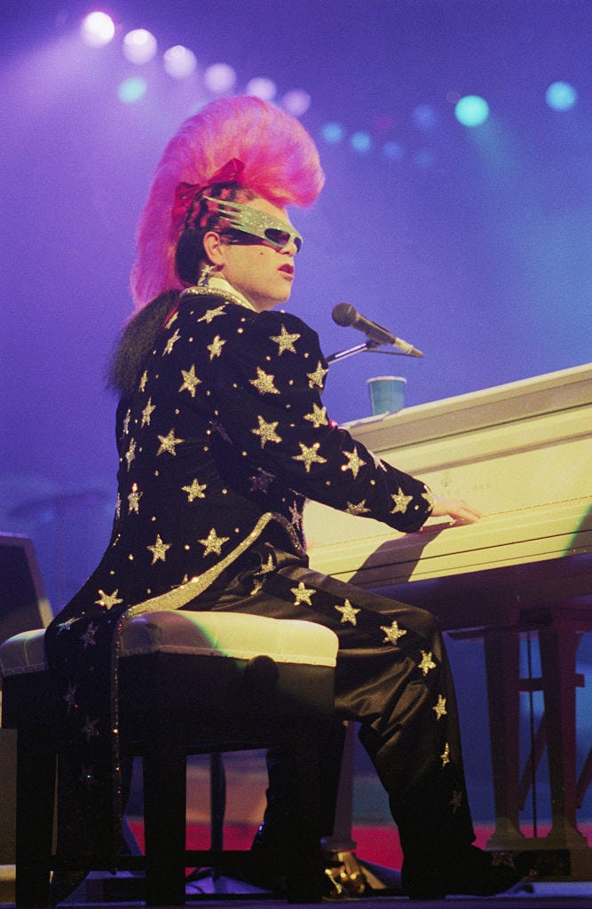 Elton John's Best Outfits Over The Years
