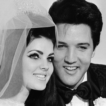 original caption 511967 las vegas, nv  singer elvis presley and his bride priscilla ann beaulieu, pose for photograph following their wedding at the aladdin hotel presley, 31, met his 22 year old bride when he was stationed in germany during his army service