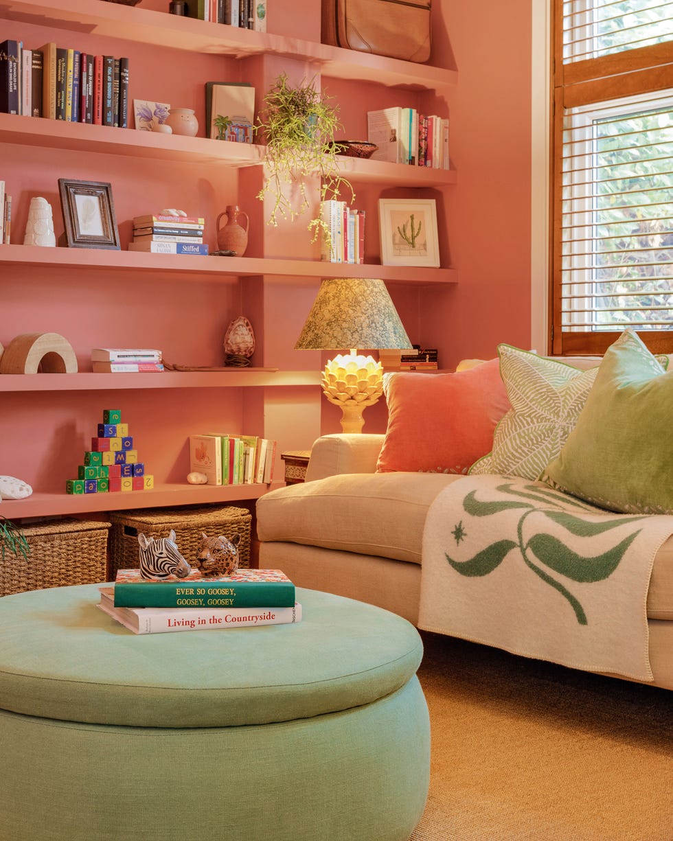 room with sofas and paintings