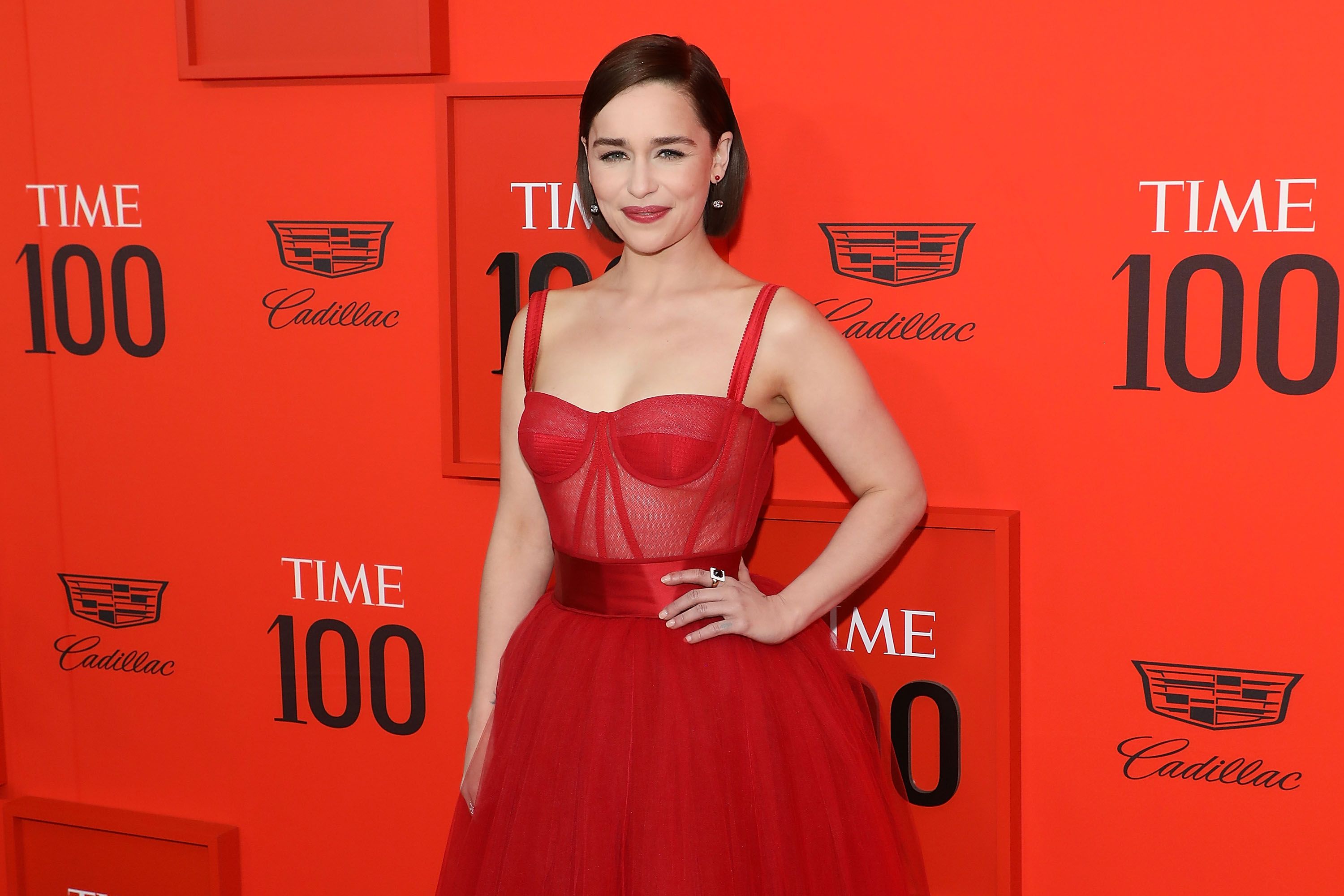 Emilia Clarke Wears Red Sheer Dolce & Gabbana Dress to the Time