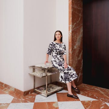 emilia wickstead photographed with her antique liqour drinks trolley photography by andrew urwin