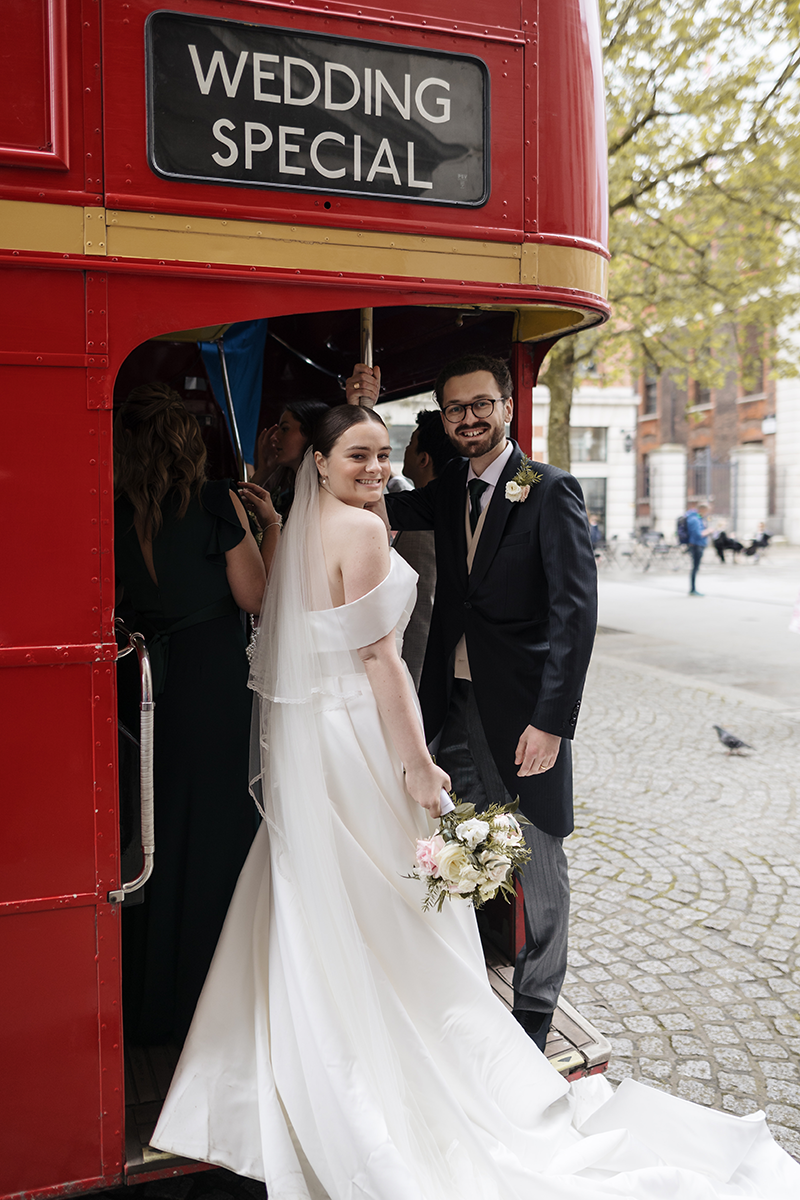 st pauls cathedral london wedding a bride and groom posing for a picture