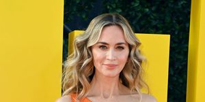 emily blunt attends the los angeles premiere of the fall guy and looks toned in her orange dress