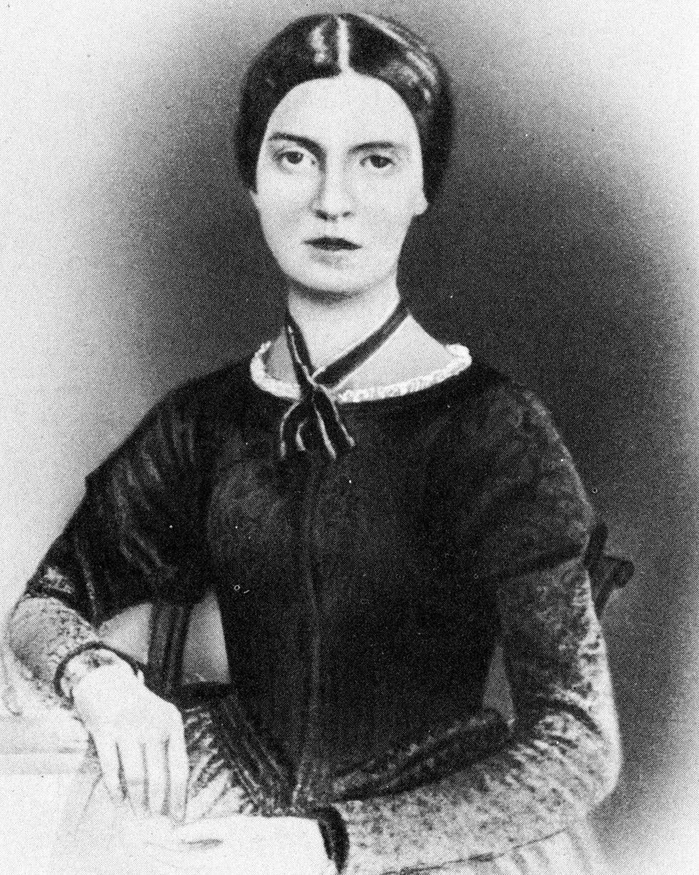 Famous poet Emily Dickinson is known for works like 'Hope Is the Thing with Feathers' a black and white portrait photo showing emily dickinson