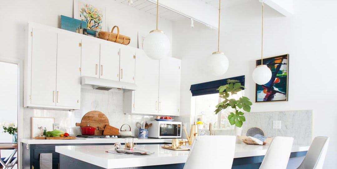 14 Genius Ideas For The Awkward Space Above Your Kitchen Cabinets