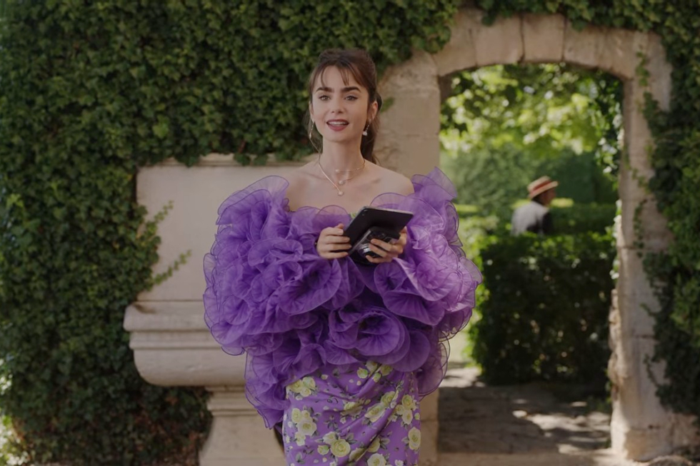 lily collins in emily in paris season 3 wearing a flounced jacket and floral corset dress