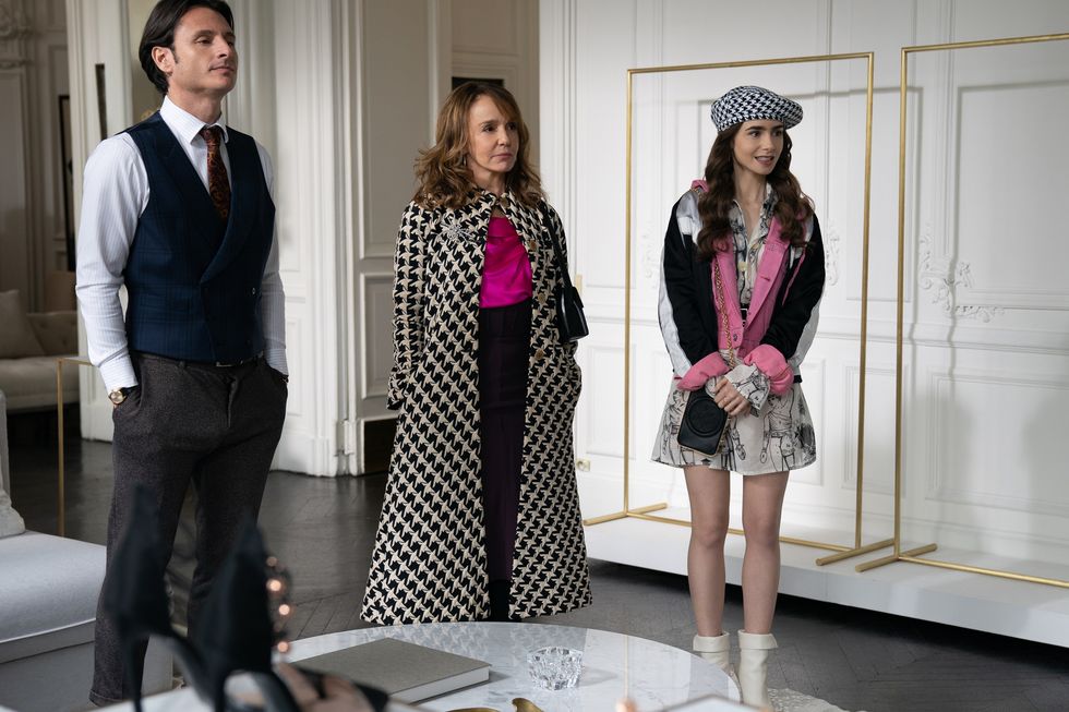 emily in paris l to r philippine leroy beaulieu as sylvie grateau and lily collins as emily in episode 110 of emily in paris cr stephanie branchunetflix © 2020