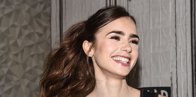 Lily Collins steps onto Emily In Paris set in ruffled lilac sundress teamed  with towering heels