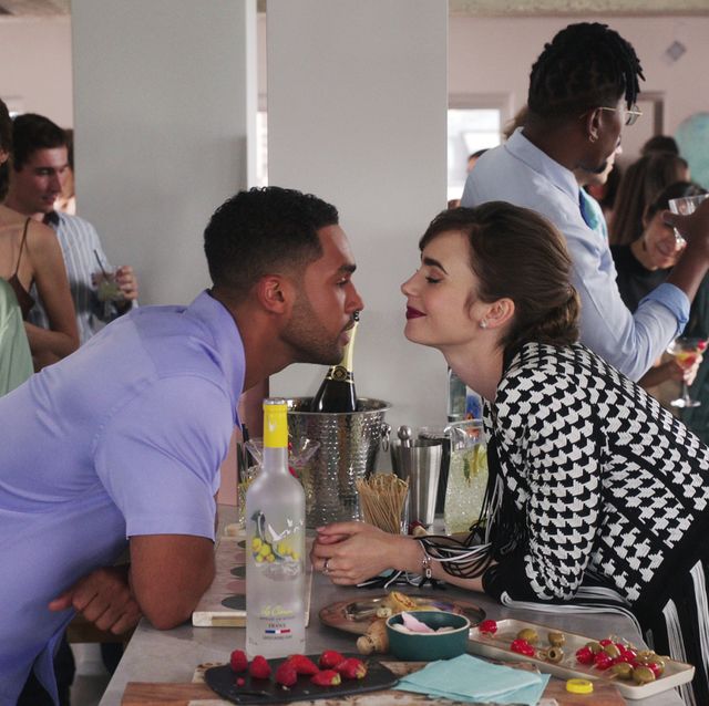 emily in paris l to r lucien laviscount as alfie, lily collins as emily in episode 305 of emily in paris cr courtesy of netflix © 2022