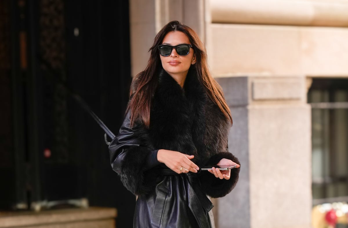 Emily Ratajkowski looks stunning in black fur-lined trench coat